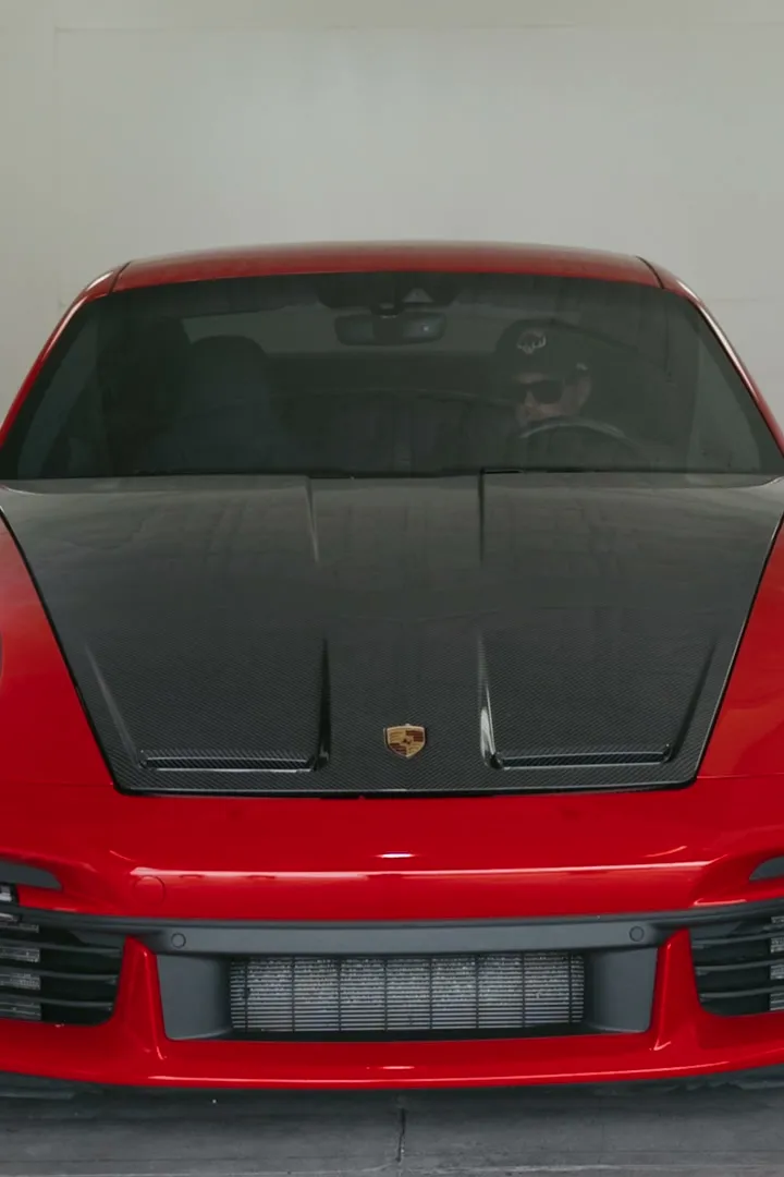 Red Porsche 911 in the Royal Armor spray booth