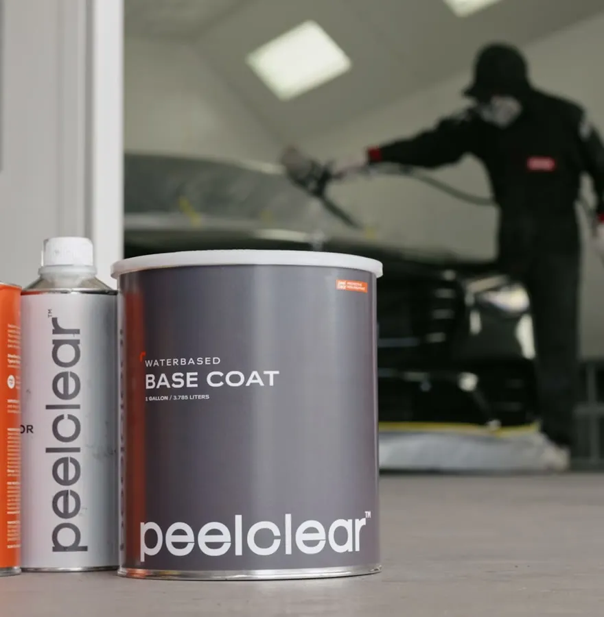 Peel Clear base coat and top coat cans in the Royal Armor booth
